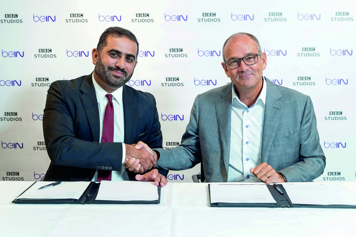 Yousef Al Obaidly (left), Deputy Chief Executive Officer of beIN Media Group, and Paul Dempsey, President for Global Markets at BBC Studios, during the signing of the agreement.