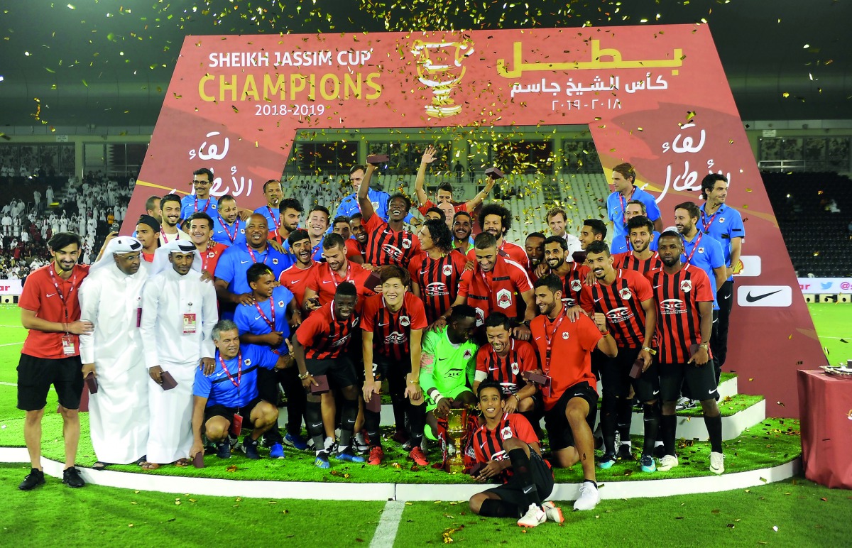 Al Rayyan’s players and officials celebrate their Sheikh Jassim Cup final victory in this last Wednesday’s file photo. 