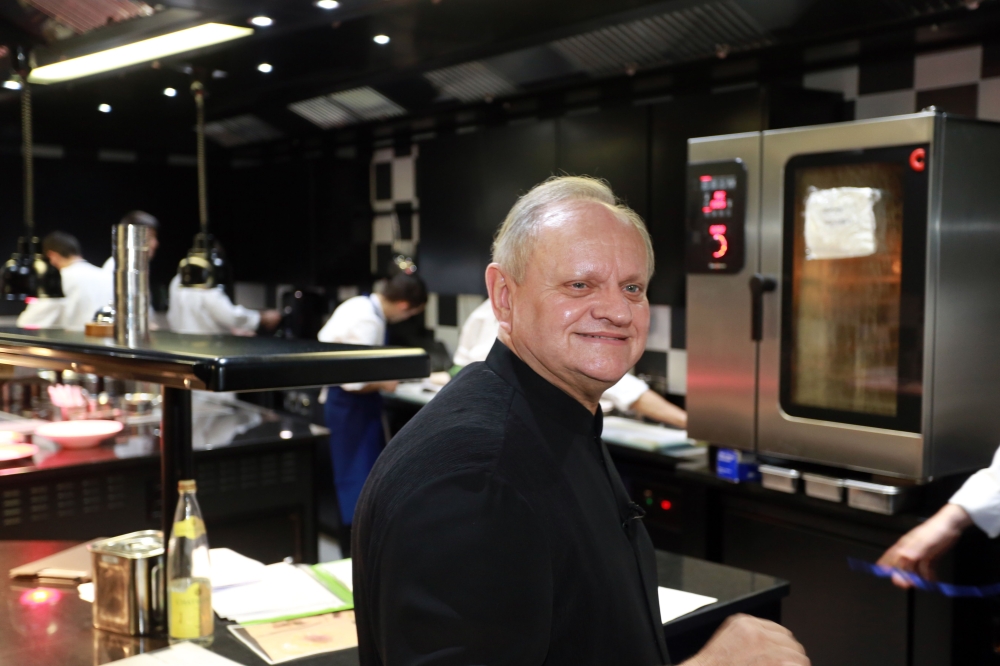 In this file photo taken on December 06, 2014 French cook Joel Robuchon is pictured in Bordeaux, southwestern France, in the kitchen of 
