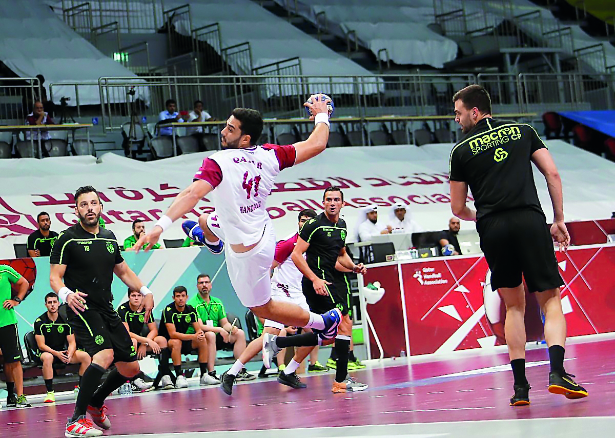 A Qatari handball player in action during a friendly match in this file photo.
