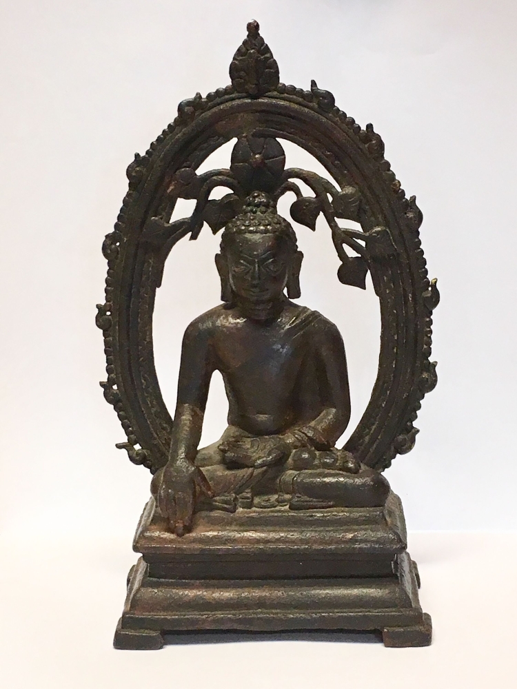 An undated handout picture released by the British Metropolitan Police Service (MPS) in London on August 15, 2018, shows a 12th century Buddha statue stolen from India 57 years ago that is to be returned to the Indian High Commissioner in London. AFP PHOT