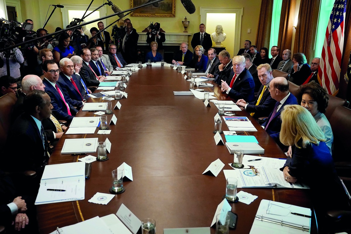 U.S. President Donald Trump addresses members of his cabinet and the news media as he holds a cabinet meeting at the White House in Washington, U.S., August 16, 2018. Reuters/Kevin Lamarque