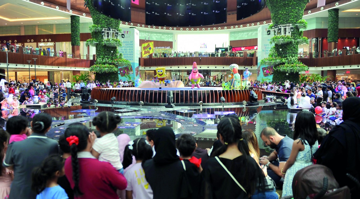 Families and children watching SpongeBob SquarePants live show as part of Eid celebrations at Mall of Qatar, yesterday. Pic:Abdul Basit / The Peninsula