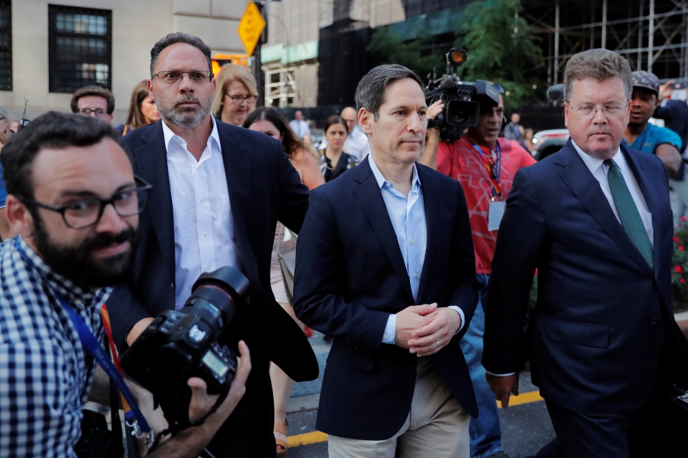 Former head of the Centers for Disease Control and Prevention, Tom Frieden (C), departs criminal court after a hearing in New York, U.S., August 24, 2018. Reuters/Lucas Jackson  