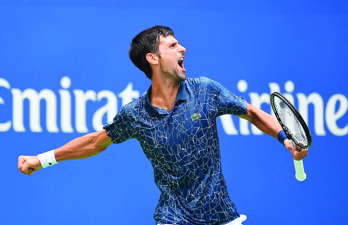 
Novak Djokovic of Serbia celebrates wining the 3rd set against Marton Fucsovics of Hungary in a first round match on day two of the 2018 U.S. Open tennis tournament at USTA Billie Jean King National Tennis Center. Credit: Robert Deutsch-USA TODAY Sports