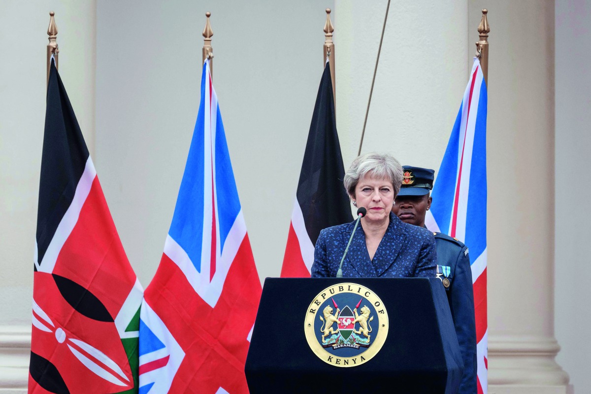 British Prime Minister Theresa May addresses a joint press conference with the Kenyan President at the State House in Nairobi on August 30, 2018.  AFP / Yasuyoshi Chiba
 