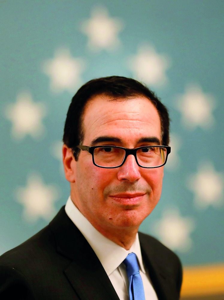 U.S. Treasury Secretary Steven Mnuchin arrives at a White House reception for Congressional Medal of Honor recipients in the East Room of the White in Washington, U.S., September 12, 2018. Reuters/Carlos Barria