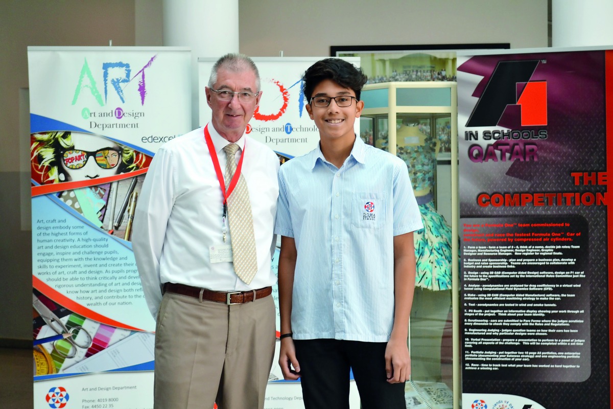 Year 11 student Justin Reece (right), with Doha British School (DBS) Principal Terry McGuire.