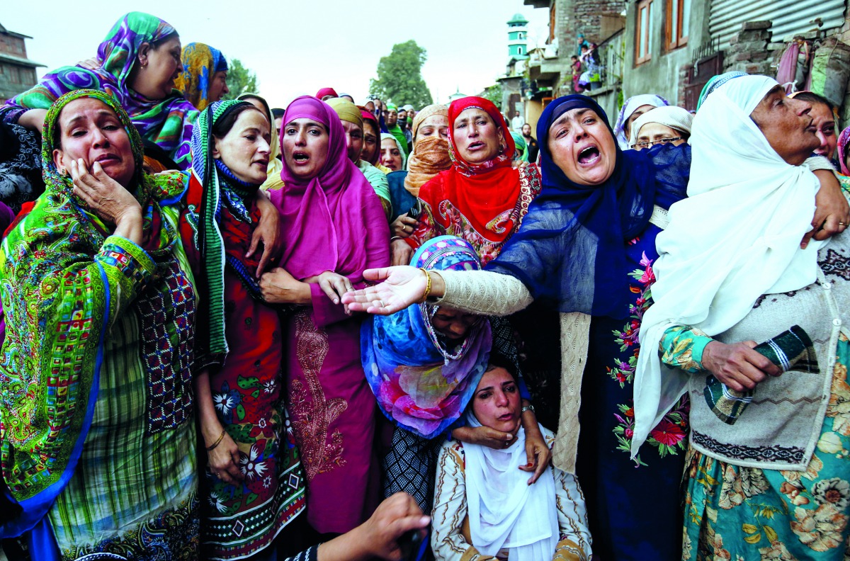 Women mourn during the funeral of Nazir Ahmad Wani, a National Conference (NC) party worker, who according to local media was killed after unknown gunmen opened fire on him in Habba Kadal area, in Srinagar, October 5, 2018. Reuters/Danish Ismail 