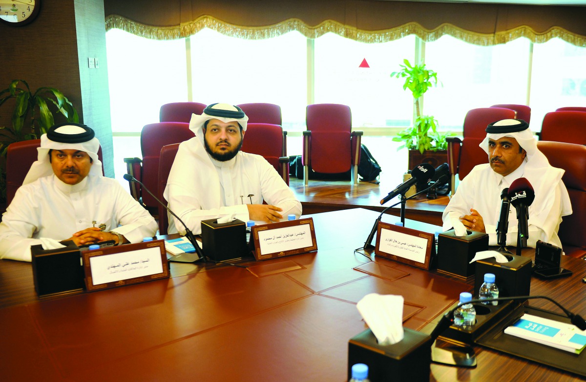 Kahramaa President Essa Bin Hilal Al Kuwari (right), with Mohammed Ali Al Mohannadi (left), Director of Public Relations and Communications Department and Manager of Production Planning, Water Resources, & Business Development, at Kahramaa Head office, ye