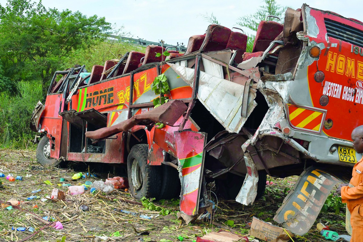 A picture shows the wreckage of a bus at the site of an accident in Kericho, western Kenya, on October 10, 2018.  AFP / Brian Ongoro