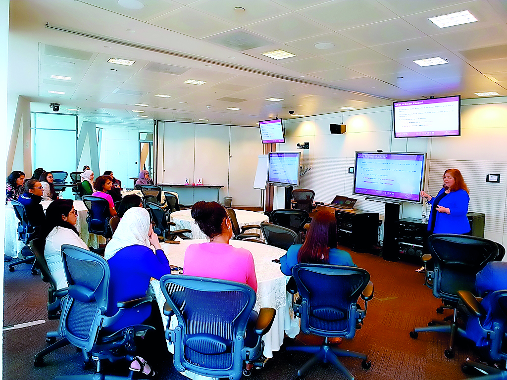 The lecture for HEC Paris in Qatar employees aimed to educate them on the benefits of getting screened in early detection of breast and bowel cancer.