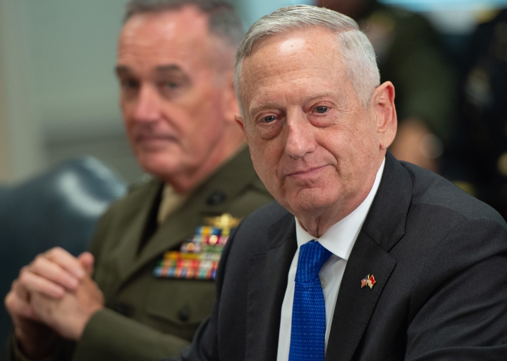 In this file photo taken on August 28, 2018 US Secretary of Defense Jim Mattis speaks alongside Chairman of the Joint Chiefs of Staff General Joseph Dunford (L) as he holds a meeting with Indonesia Defense Minister Ryamizard Ryacudu at the Pentagon in Was