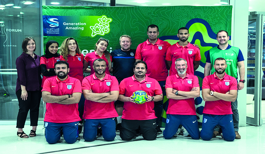 Generation Amazing  football coaches pose for a group picture. 