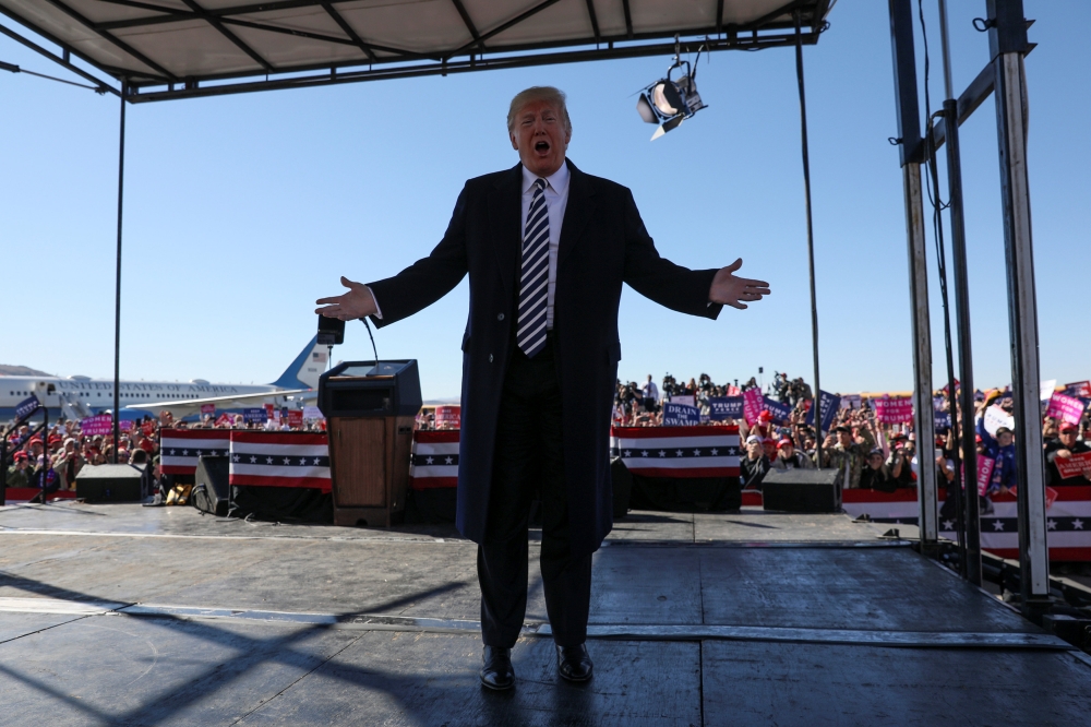 U.S. President Donald Trump rallies with supporters at Elko Regional Airport in Elko, Nevada, U.S. October 20, 2018. REUTERS/Jonathan Ernst