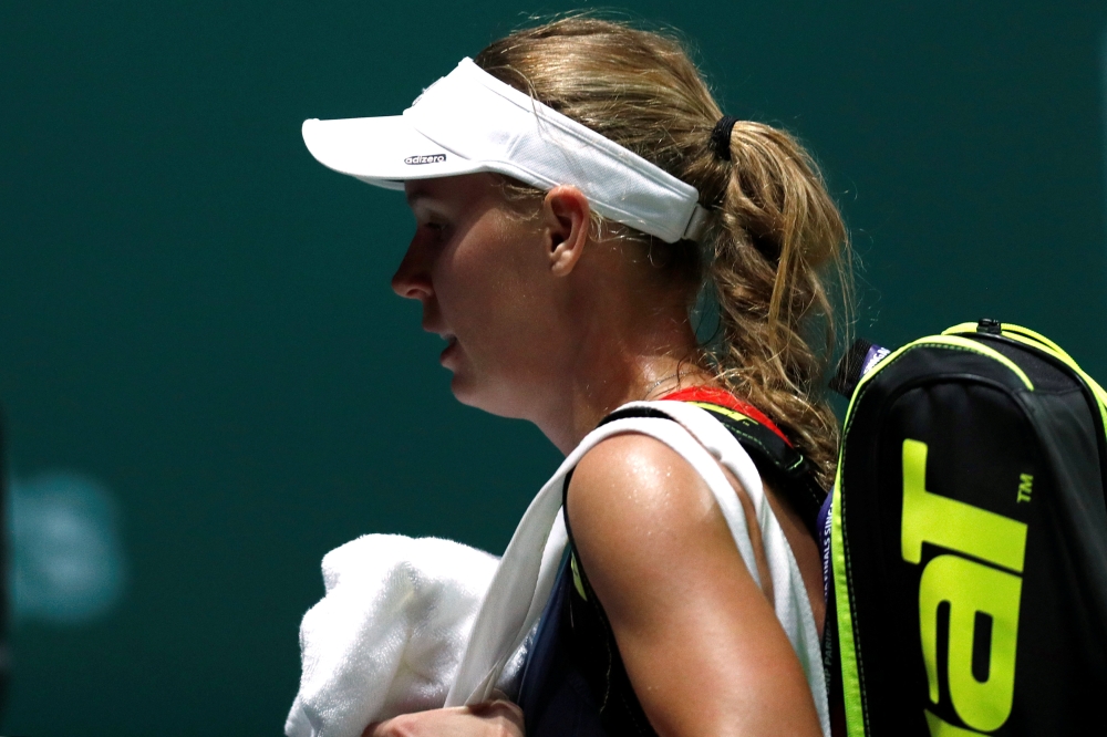  Denmark's Caroline Wozniacki after losing her group stage match against Ukraine's Elina Svitolina (REUTERS/Edgar Su)