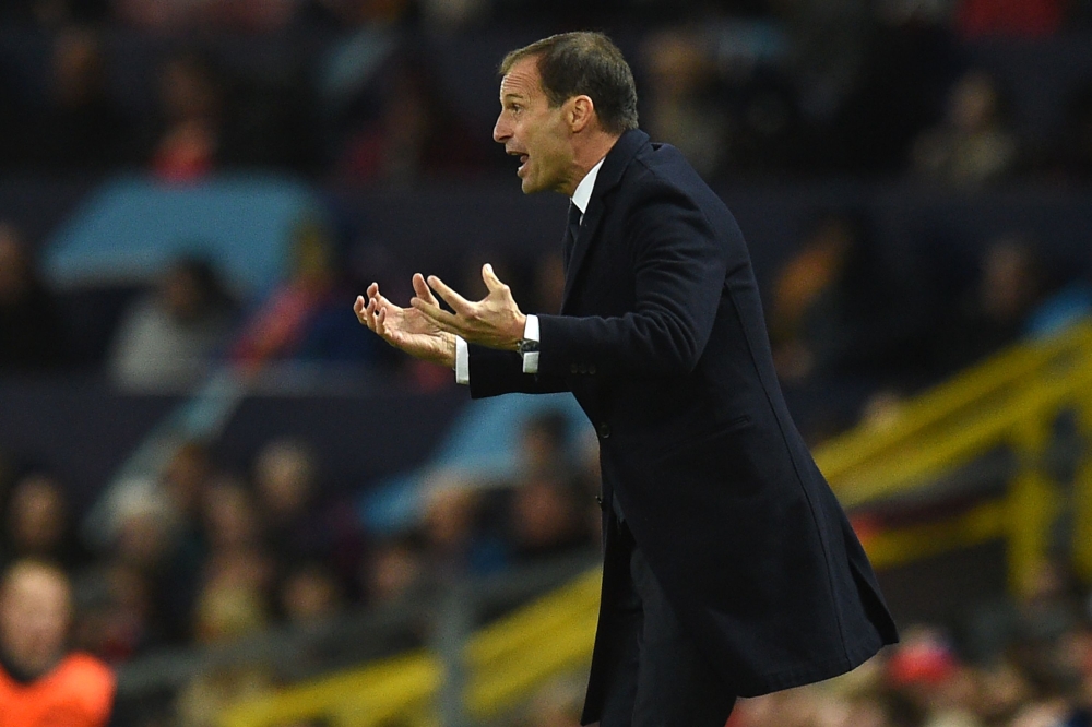 Juventus' manager Massimiliano Allegri gestures on the touchline during the Champions League group H football match between Manchester United and Juventus at Old Trafford in Manchester, north west England, on October 23, 2018. (AFP / Oli SCARFF)