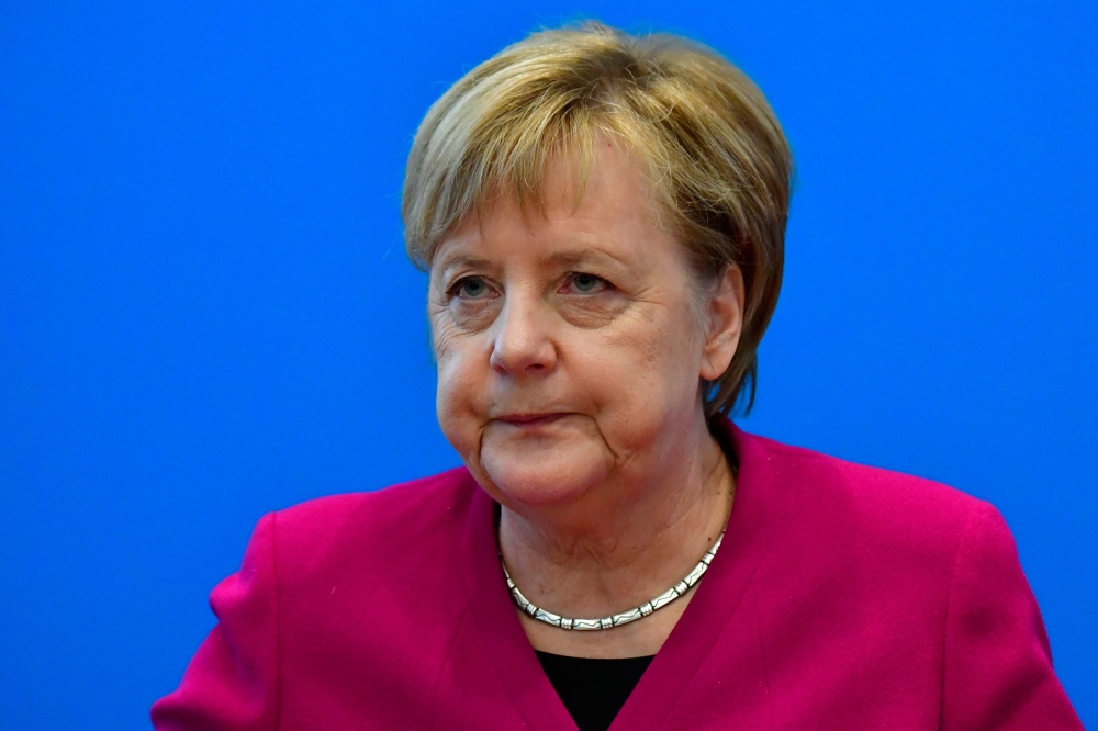 German Chancellor and leader of the Christian Democratic Union (CDU) Angela Merkel arrives to lead a CDU leadership meeting at the party's headquarters on October 29, 2018 in Berlin, a day after her fragile coalition suffered heavy losses in a key regiona