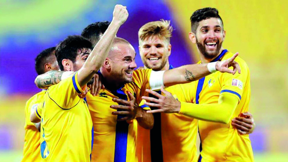 Al Gharafa players celebrate in this file picture.