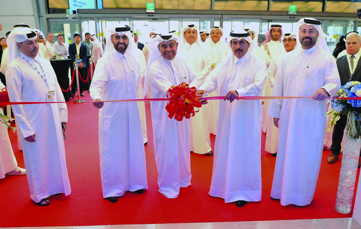 H E Ali bin Ahmed Al Kuwari (centre), Minister of Commerce and Industry; H E Sheikh Abdulla bin Saoud Al Thani (second right), Governor of Qatar Central Bank; Abdulaziz bin Nasser Al Khalifa (second left), CEO of QDB; and other senior officials during the