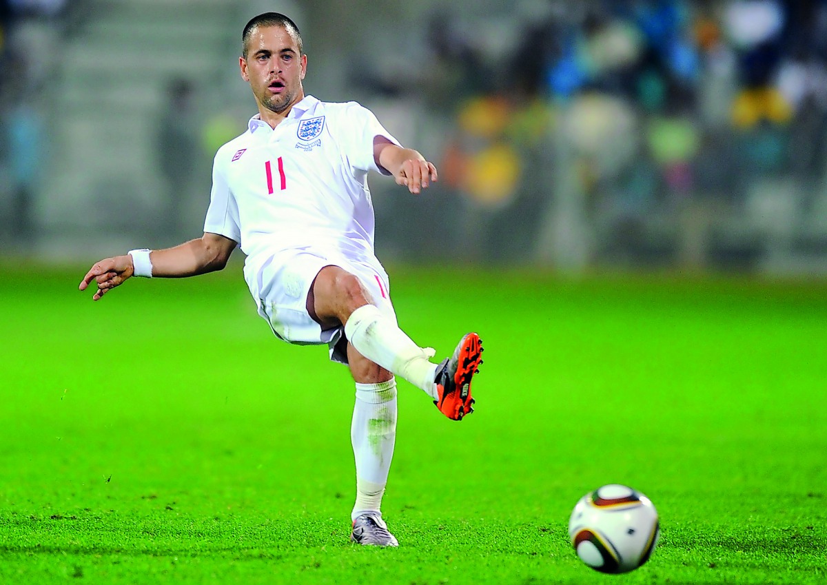  In this file photo taken on June 07, 2010 England's Joe Cole passes the ball during a friendly football match between Platinum Stars and England at The Moruleng Stadium near Rustenburg, ahead of the start of the 2010 World Cup football tournament.  AFP /