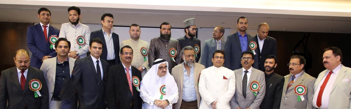 The members of Bazm-e-Alig with guests while celebrating the 201st birth anniversary of Sir Syed Ahmad Khan at Oryx Rotana Hotel, in Doha. 