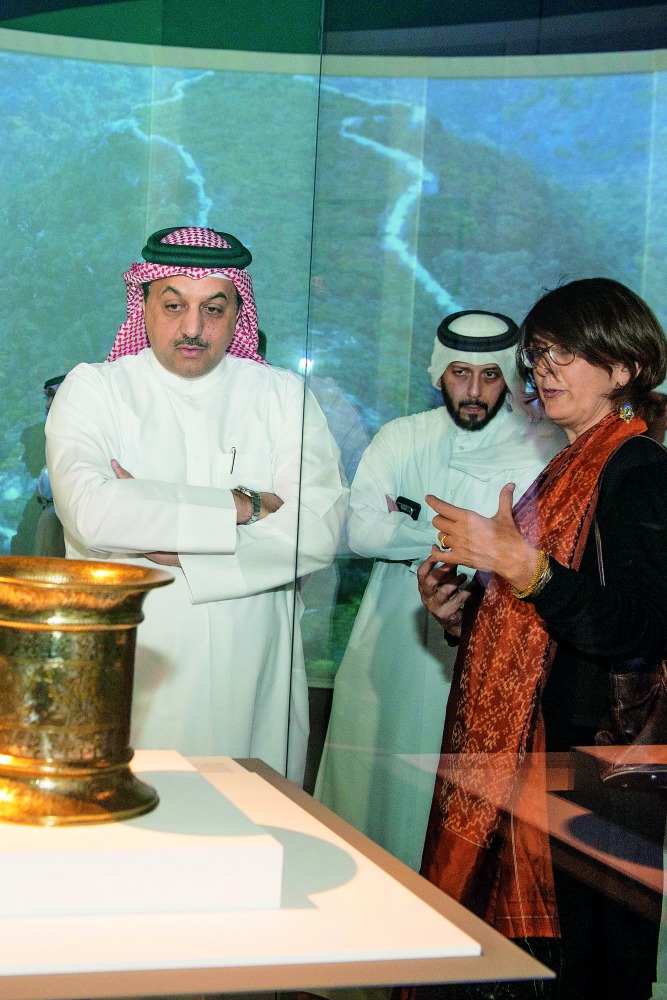 Deputy Prime Minister and Minister of State for Defence Affairs H E Dr Khalid bin Mohamed Al Attiyah being briefed by MIA Director Dr Julia Gonnella, the exhibition co-curator. 