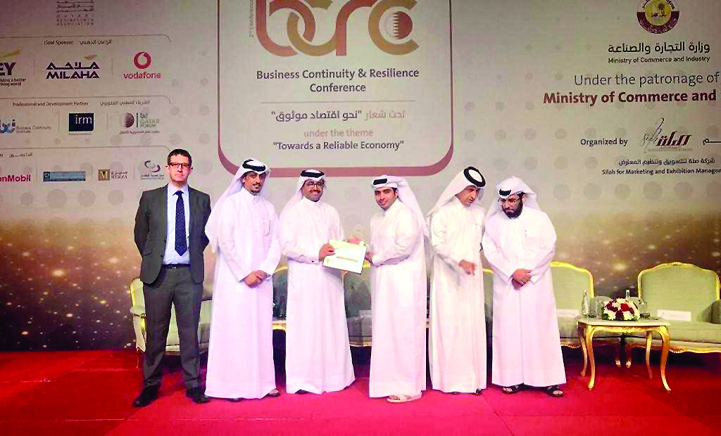 Officials with the award.