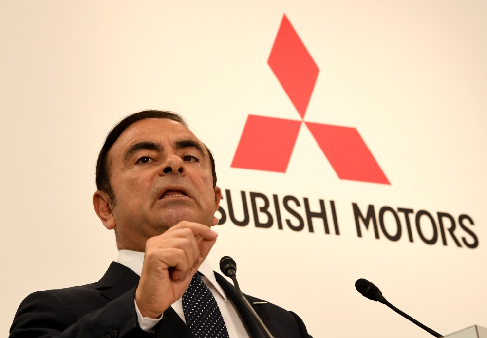 FILE PHOTO: In this file photo taken on October 20, 2016 Nissan Motors chairman and CEO Carlos Ghosn answers a question during a joint press conference in Tokyo.   AFP / TOSHIFUMI KITAMURA