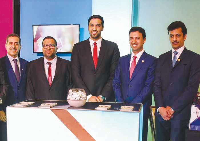 Officials at the QNB booth during the second student union forum in Los Angeles, California.