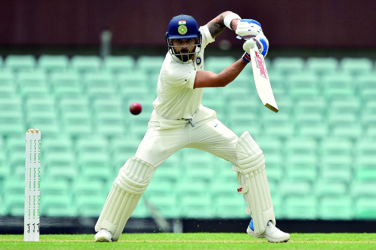 India's batsman Virat Kohli plays a shot on the second day of the tour match against Cricket Australia XI at the SCG in Sydney on November 29, 2018.  AFP / Peter Parks