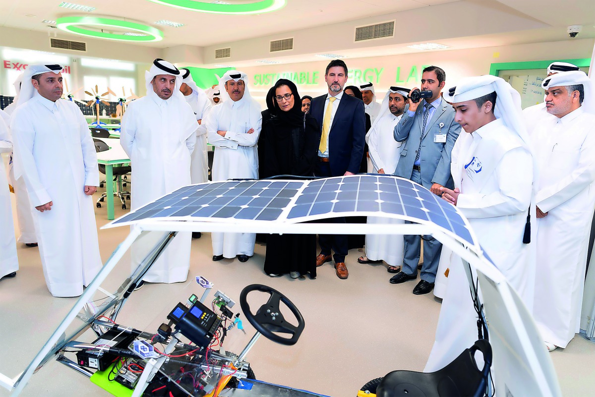 Prime Minister and Interior Minister H E Sheikh Abdullah bin Nasser bin Khalifa Al Thani (second left) and Minister of Education and Higher Education H E Dr. Mohamed bin Abdul Wahed Al Hammadi (left) and other dignitaries visiting a lab at the Qatar Schoo