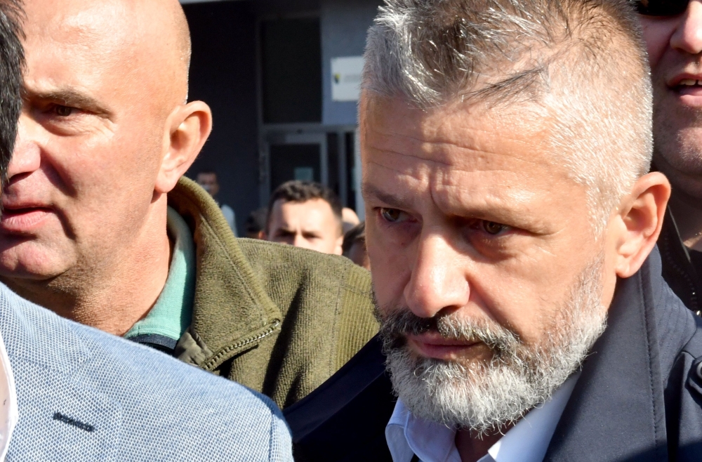 In this file photo taken on October 09, 2017 Naser Oric, wartime commander of Bosnian Muslim forces in the area of Srebrenica and Bratunac, leaves court in Sarajevo on October 9, 2017. / AFP / ELVIS BARUKCIC 