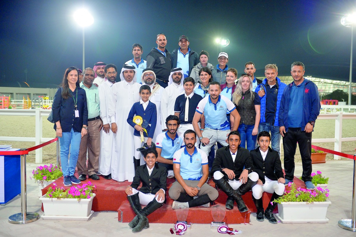 The podium winners, their trainers and Al Shaqab officials pose for a photograph following the presentation ceremony of the EED Internal Competition at the Al Shaqab Arena on Thursday.