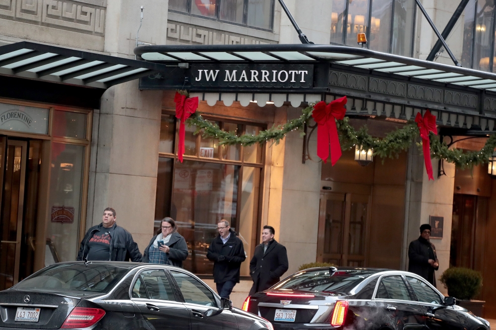 A sign marks the location of a J.W. Marriott hotel on November 30, 2018 in Chicago, Illinois. Scott Olson/Getty Images/AFP