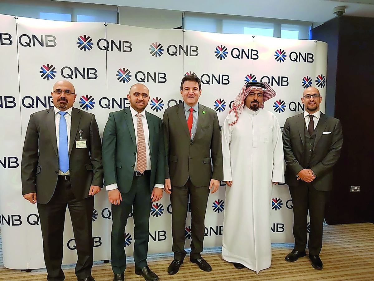 Senior officials of QNB and NCR Banking Services for Middle East and Africa at the launching ceremony in Qatar.