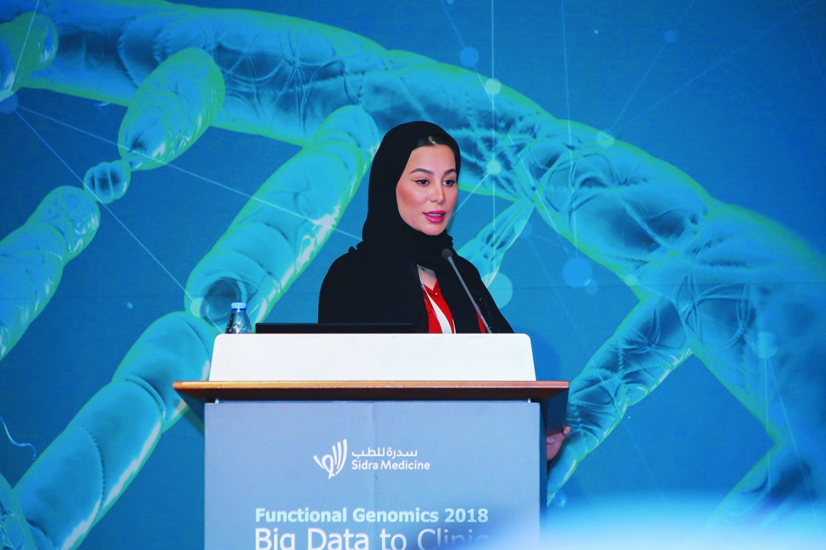 Sara Al Khawaga, a PhD student at HBKU’s College of Health and Life Sciences, speaking at the symposium.