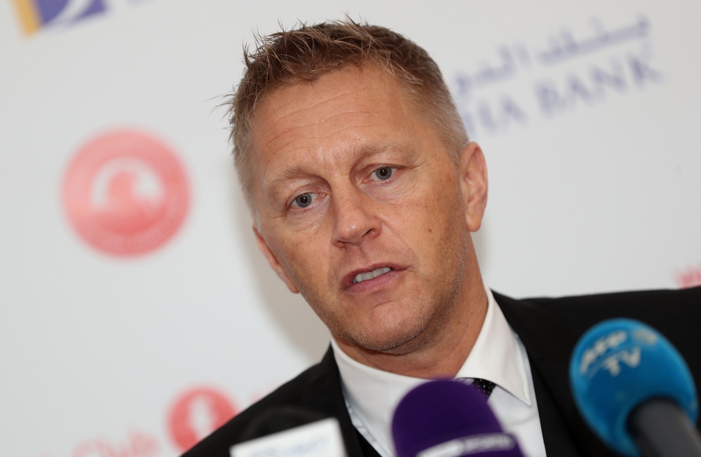 Heimir Hallgrimsson, Iceland's former football coach, speaks at a press conference after signing a renewable contract with the Qatari al-Arabi team in Doha, on December 11, 2018. AFP / KARIM JAAFAR

