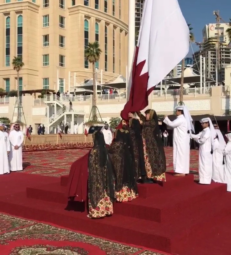 The children dressed in traditional dresses performing at National Day celebrations ceremony marked at Ooredoo headquarters. 