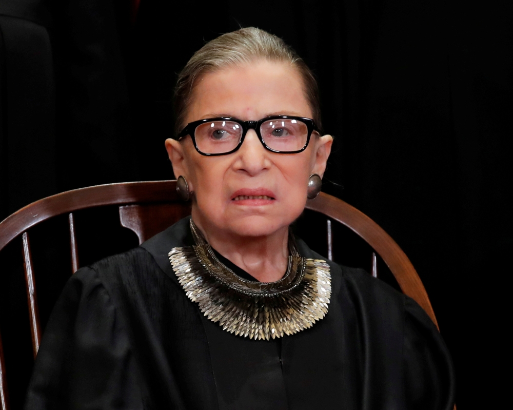 US Supreme Court Associate Justice Ruth Bader Ginsburg is seen during a group portrait session for the new full court at the Supreme Court in Washington, November 30, 2018. Reuters/Jim Young
