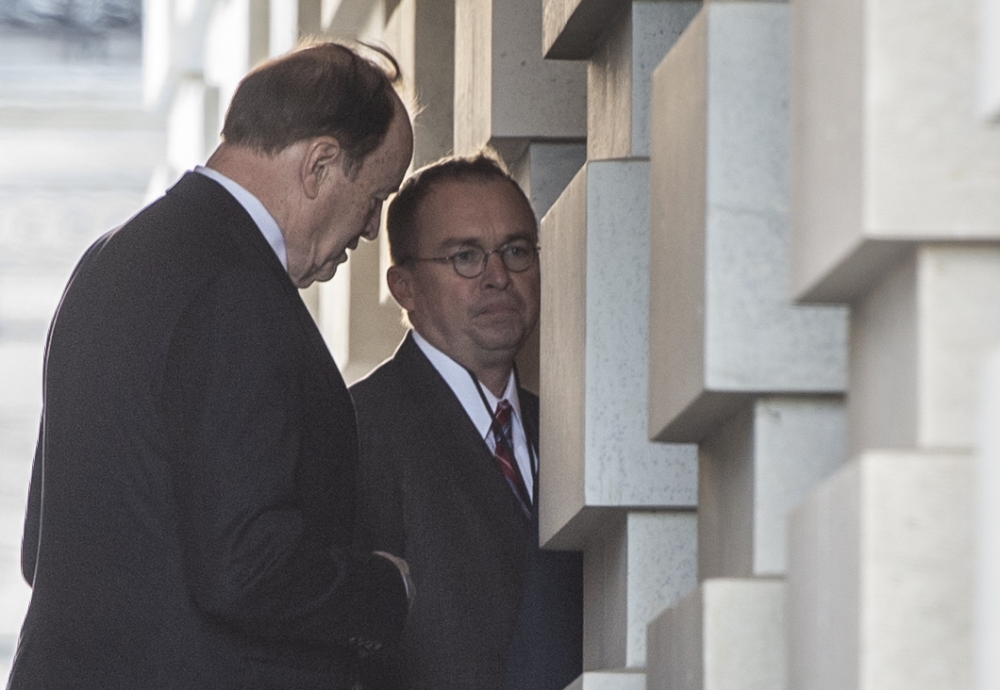Incoming White House Chief of Staff Mick Mulvaney (R) speaks with US Senator Richard Shelby as they arrive at the US Capitol in Washington, DC, on December 22, 2018,  AFP / Andrew CABALLERO-REYNOLDS