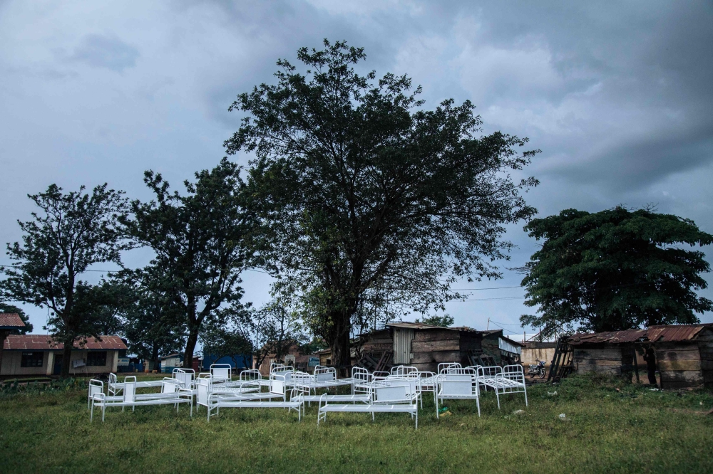 Hospital beds are stored outside ransacked tents by demonstrators by the Ebola transit centre in Beni, following a demonstration against the postponement of elections in the territory of the Beni and the city of Butembo on December 27, 2018. AFP / ALEXIS 