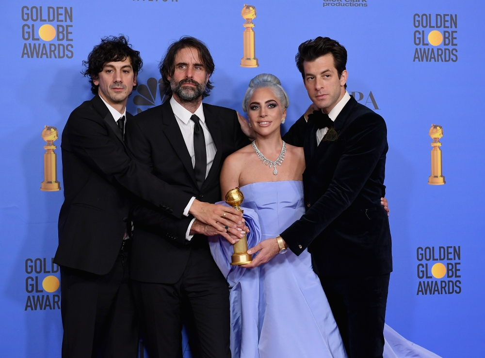 Winners for Best Original Song - Motion Picture for 'Shallow - A Star is Born' (R-L) Mark Ronson, Lady Gaga, Andrew Wyatt and Anthony Rossomando pose with the trophy in the press room during the 76th Annual Golden Globe Awards at The Beverly Hilton Hotel 