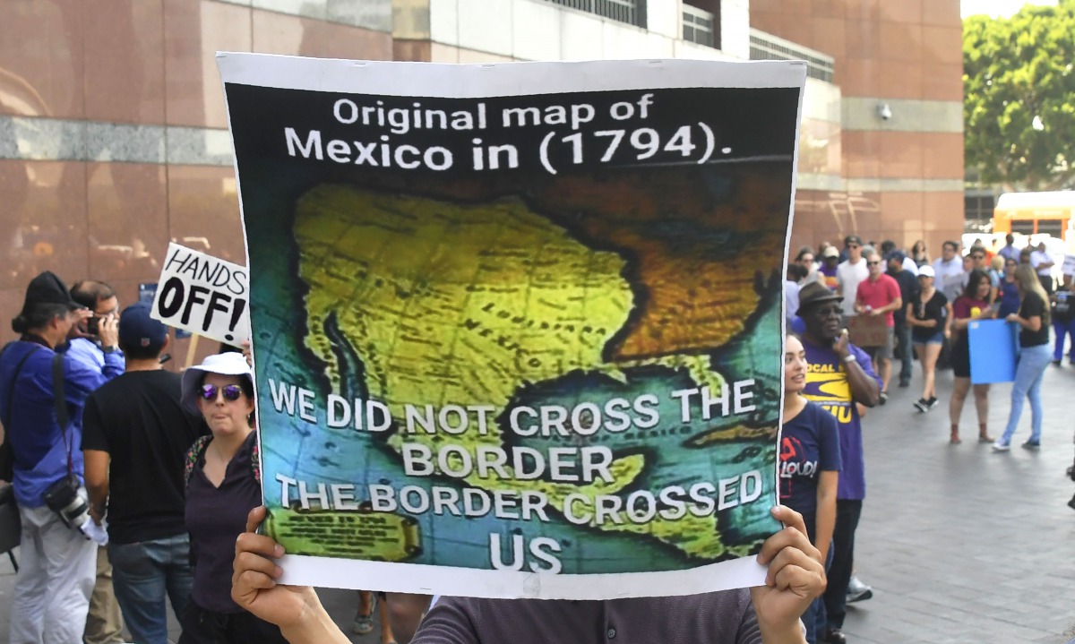 A map of Mexico as it was in 1794 is displayed as young immigrants and their supporters rally in support of DACA in Los Angeles on September 1, 2017. AFP/Frederic J Brown