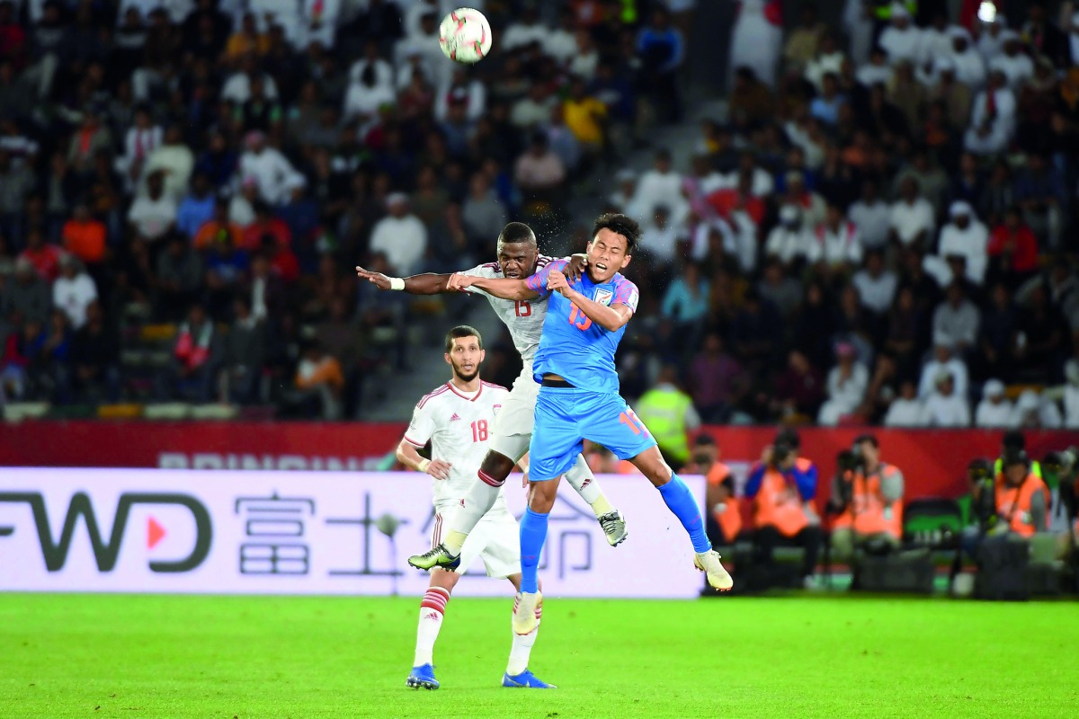 United Arab Emirates’ midfielder Ismail Al Hamadi (centre) vies for the ball with India’s midfielder Udanta Singh during their 2019 AFC Asian Cup group A match  played at Zayed Sports City Stadium in Abu Dhabi, yesterday.