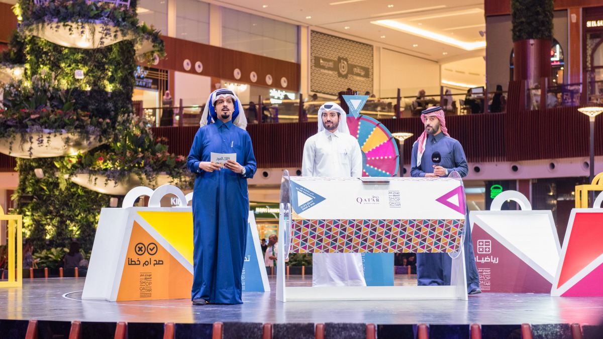 An official holding Shop Qatar 2019 raffle draw at Mall of Qatar.
