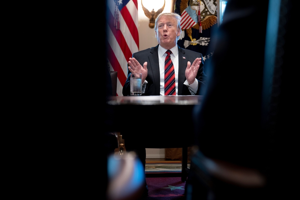 US President Donald Trump speaks during a meeting on border security in the Cabinet Room of the White House January 11, 2019 in Washington, DC. / AFP / Brendan Smialowski