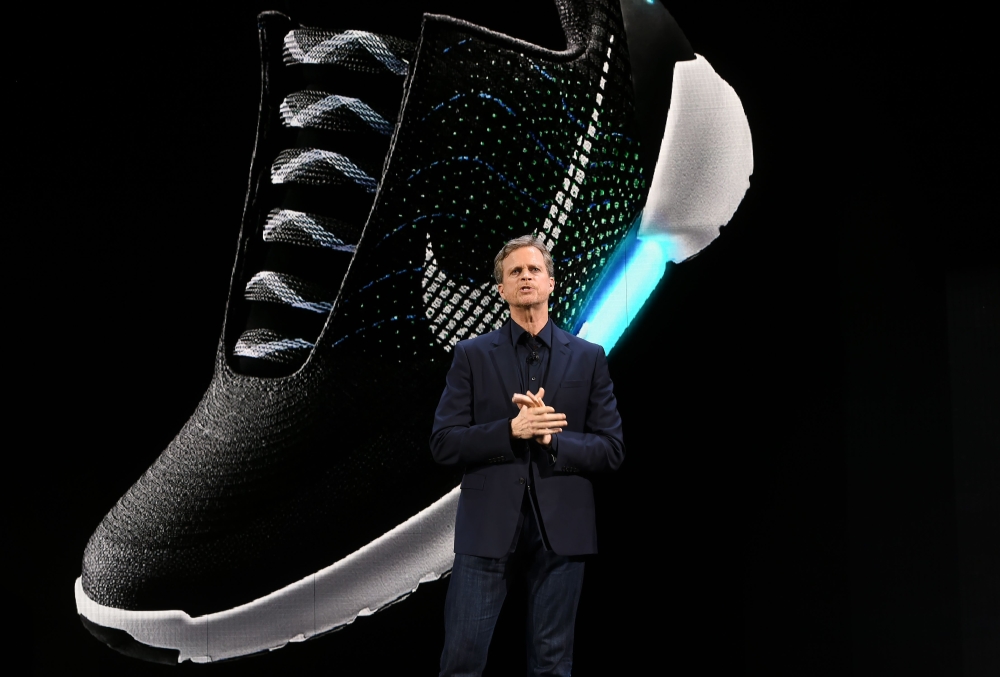 Nike president Mark Parker reveals their latest innovative sports products during an event in New York In this file photo taken on March 16, 2016.  AFP / Jewel Samad 