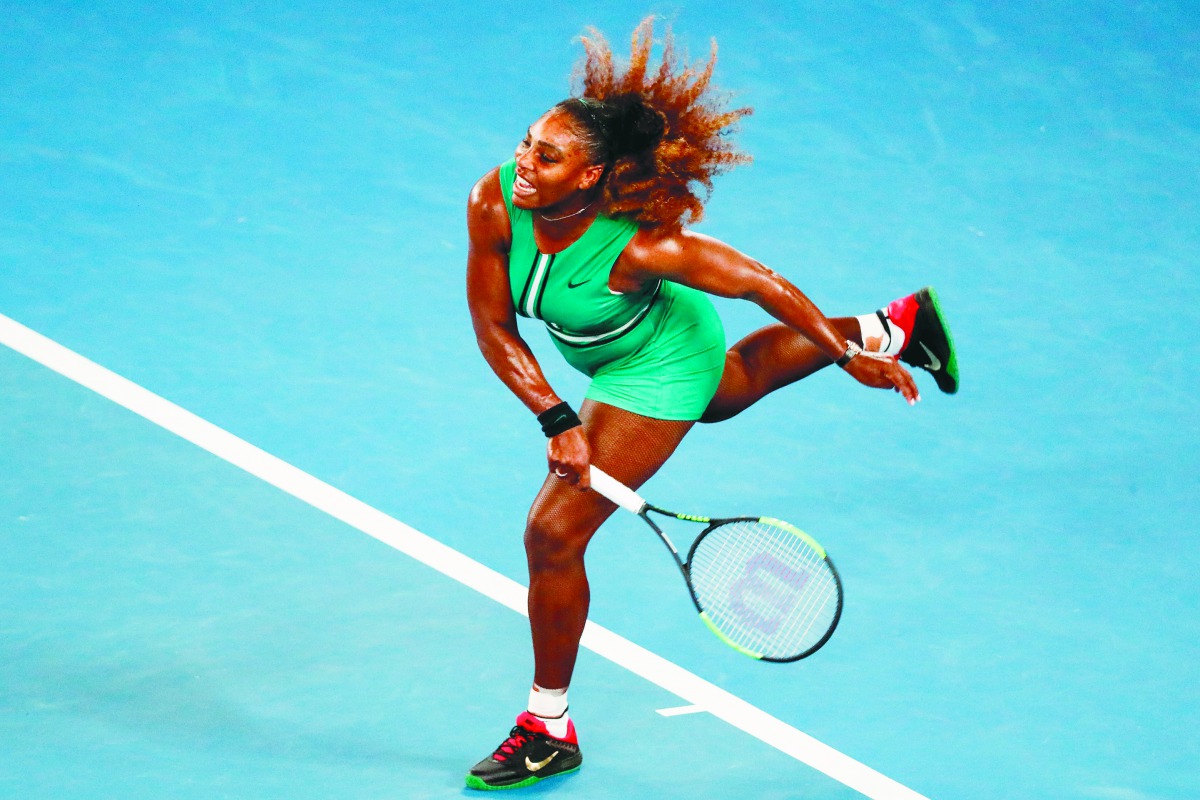 Serena Williams of the US serves against Canada's Eugenie Bouchard during their women's singles match on day four of the Australian Open tennis tournament in Melbourne on January 17, 2019. AFP / David Gray