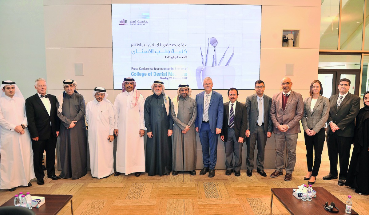 Qatar University President Dr Hassan Al Derham (centre), and other dignitaries pose for a group photo during a press conference to announce the College of Dental Medicine held at Qatar University, yesterday. Pic: Baher Amin / The Peninsula